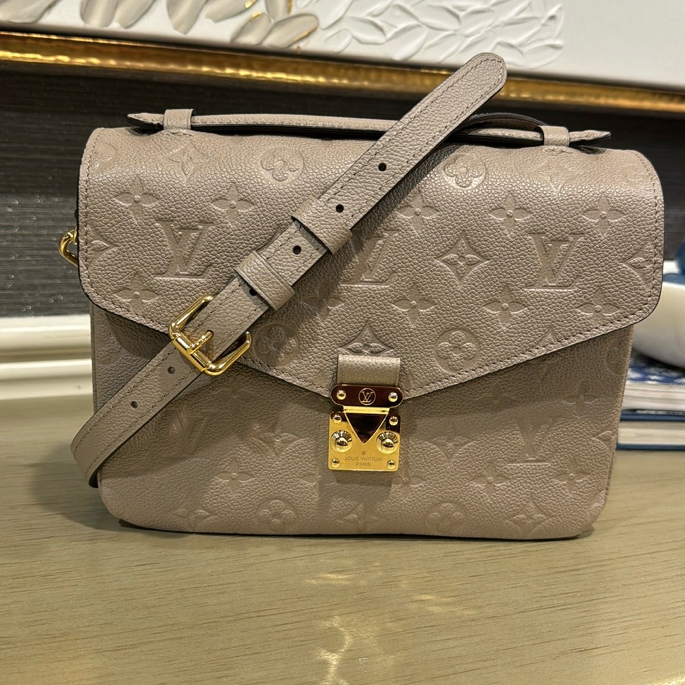 Louis Vuitton Pochette Métis Handbag.